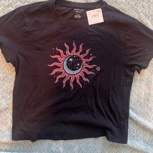 American Eagle Black Tee with Pink Sun Design